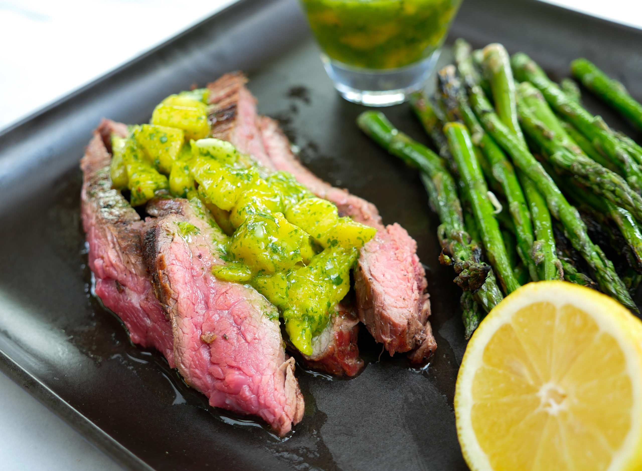 Eva Amurri shares her recipe for Grilled Skirt Steak with Mango Chimichurri