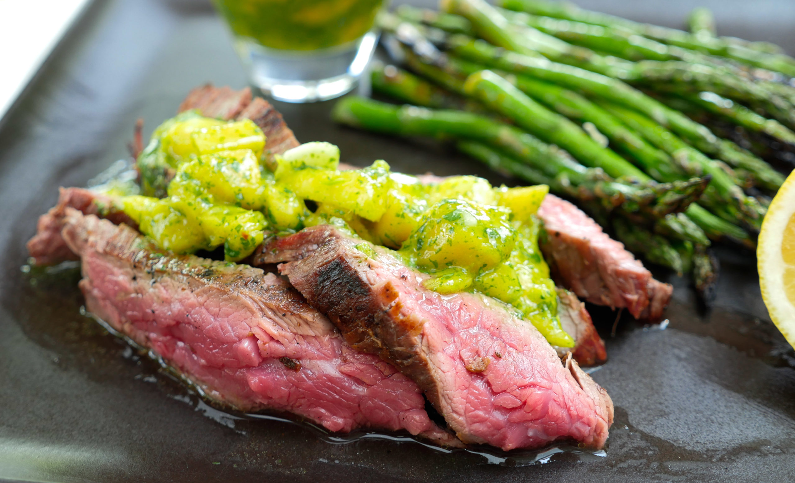 Eva Amurri shares her recipe for Grilled Skirt Steak with Mango Chimichurri