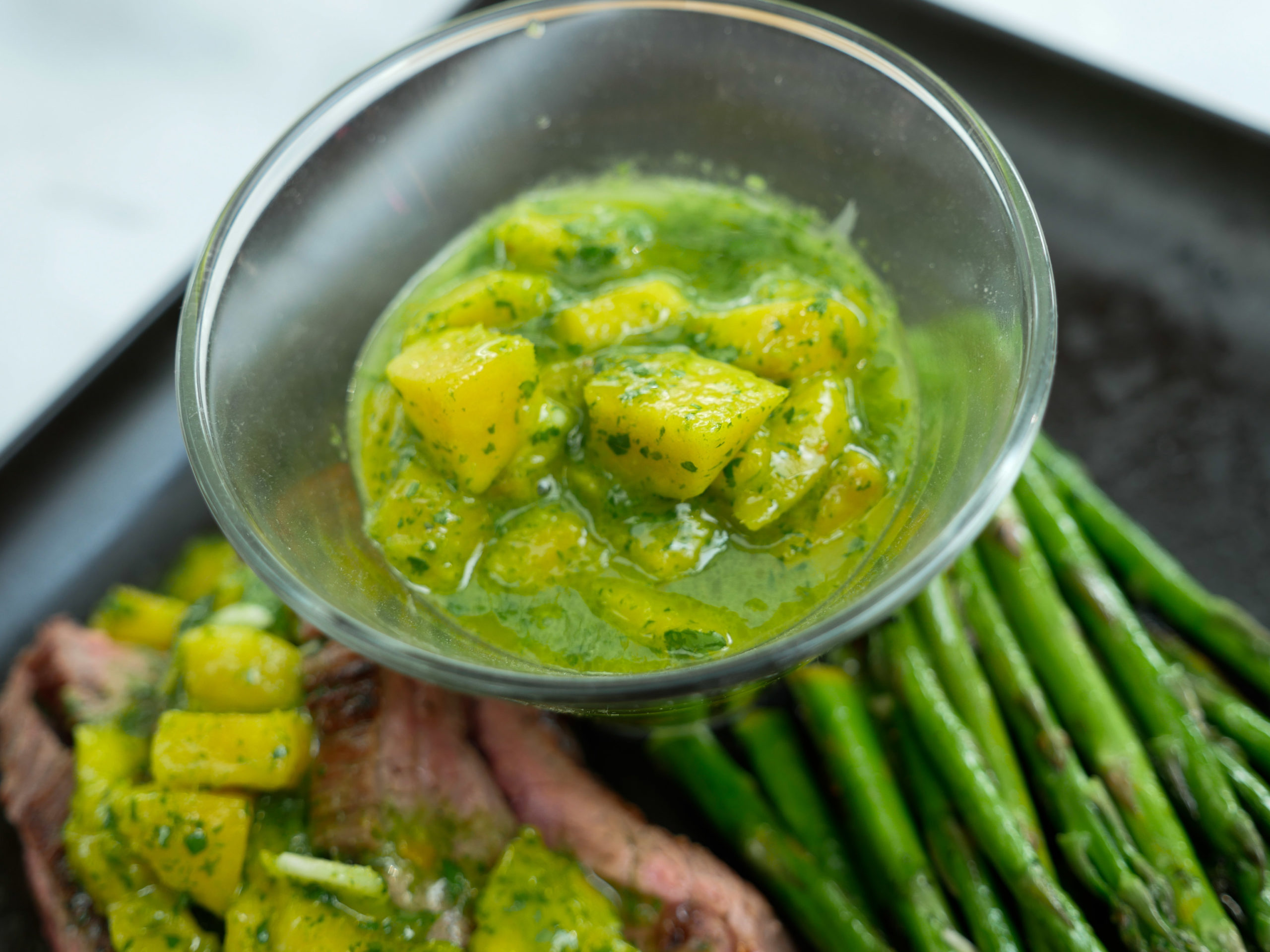 Eva Amurri shares her recipe for Grilled Skirt Steak with Mango Chimichurri