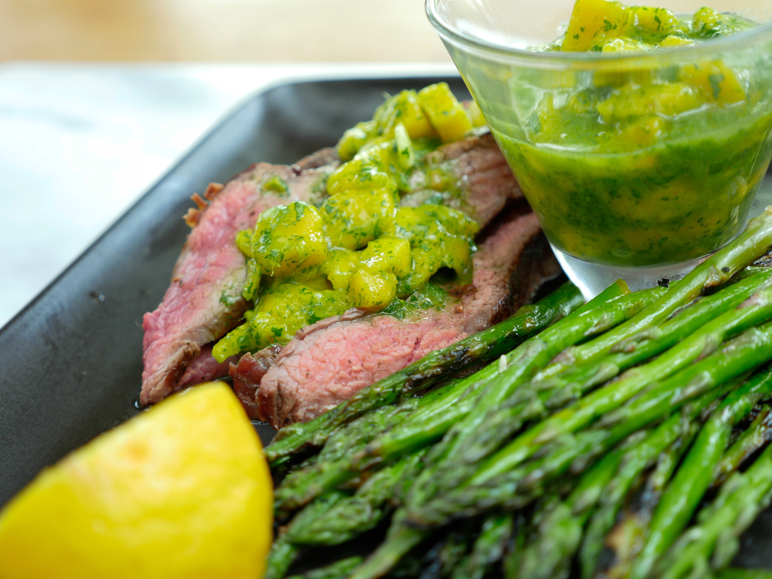 Eva Amurri shares her recipe for Grilled Skirt Steak with Mango Chimichurri