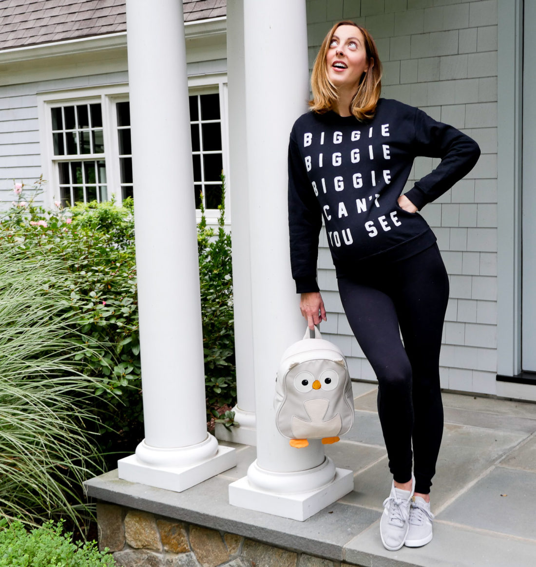 Eva Amurri Martino of Lifestyle blog REZTT at 34 weeks pregnant wearing black maternity leggings and a