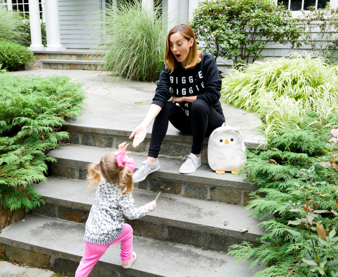 Eva Amurri Martino of lifestyle blog REZTT wearing black maternity leggings and a