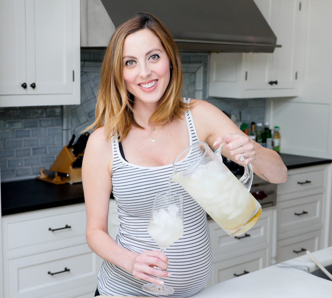 Eva Amurri Martino of lifestyle blog REZTT making a hydrating drink she plans to utilize during her home birth