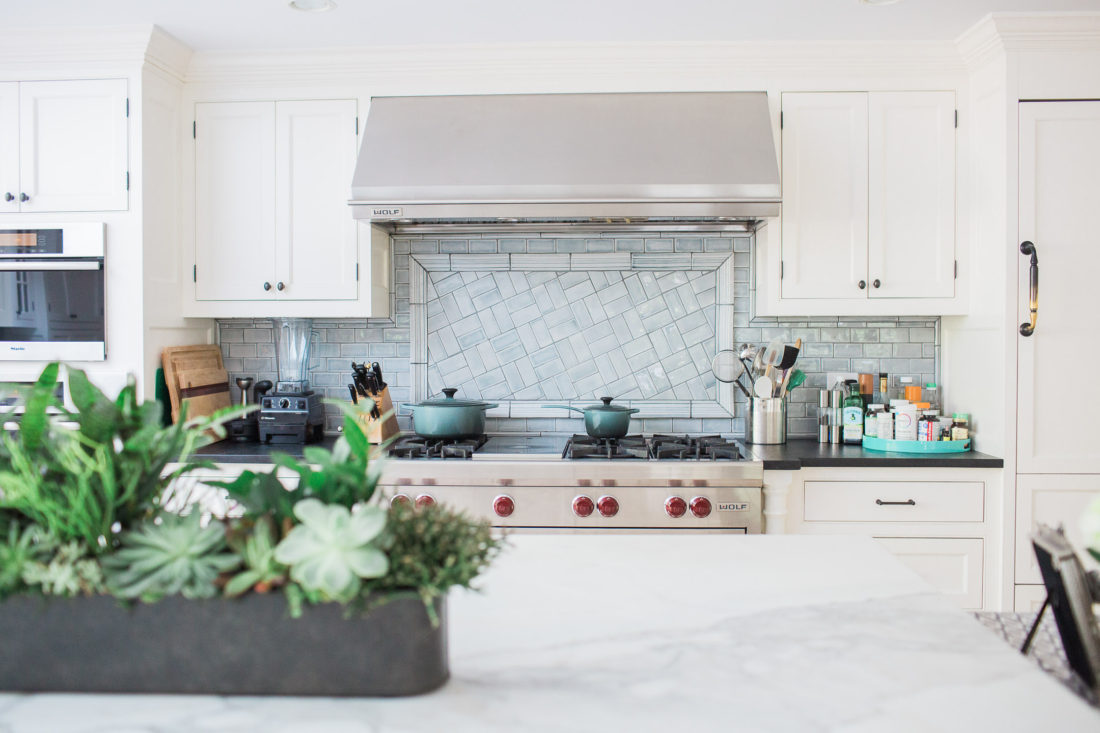The stovetop range in the light and bright kitchen of lifestyle blogger Eva Amurri Martino in her new home in connecticut