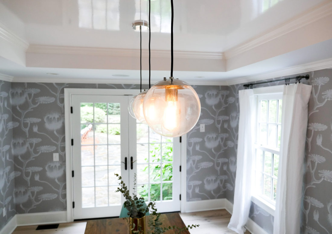 A close up of the lighting in the bright and airy dining room of REZTT's Eva Amurri Martino
