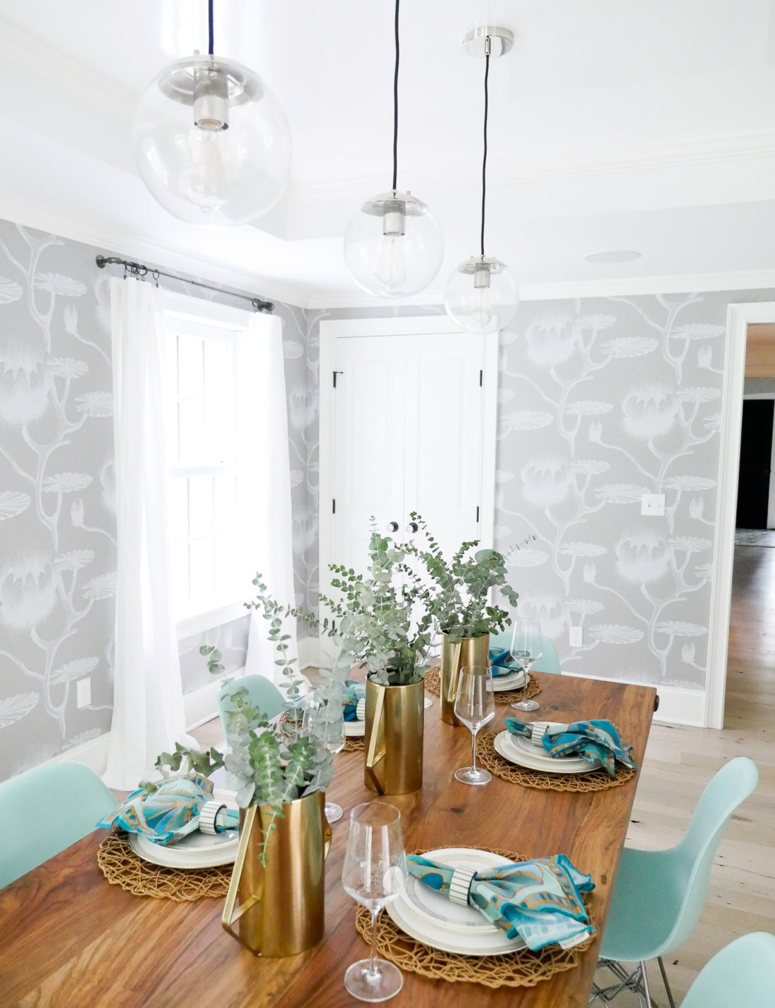 A shot of the fully set table in Eva Amurri Martino's bright and airy california-inspired dining room in connecticut