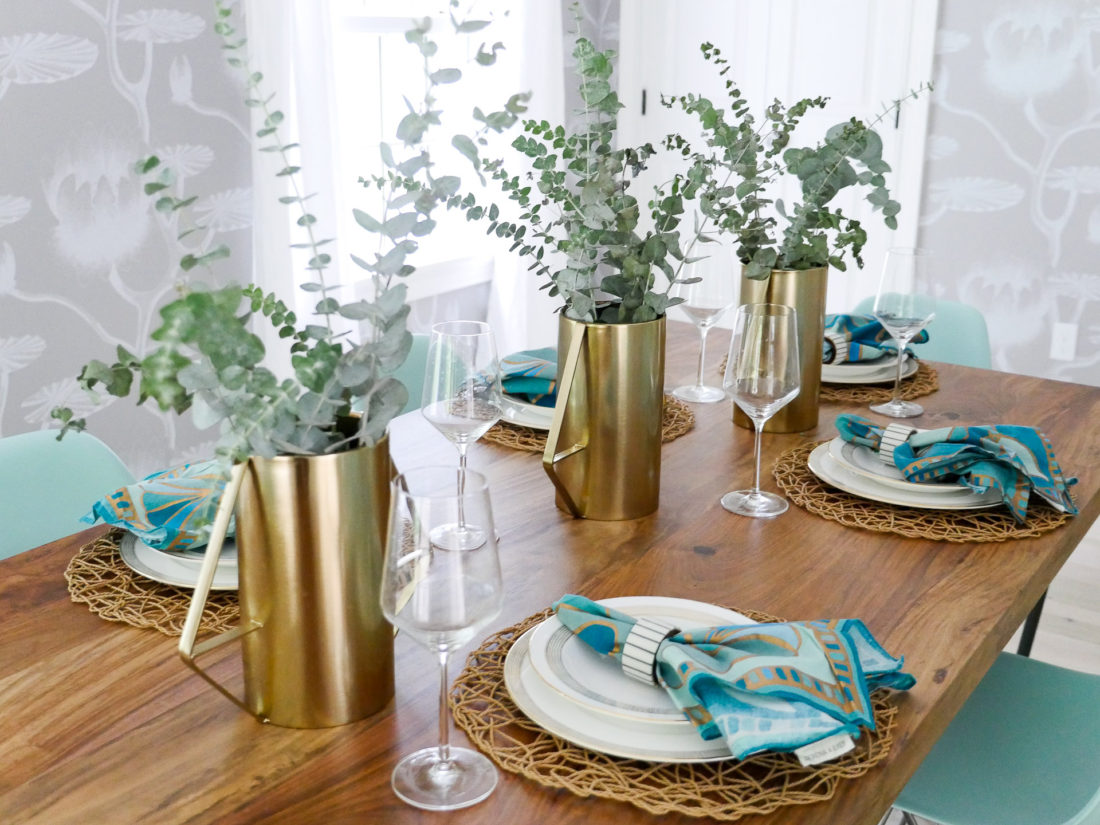 A shot of the fully set table in Eva Amurri Martino's dining room in connecticut, featuring a light and airy Californian vibe with industrial accents