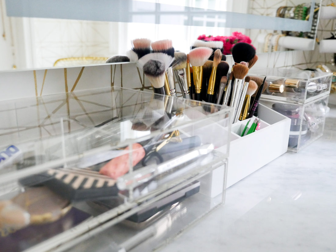 A close up of the makeup storage in the glam room of eva amurri martino's connecticut home