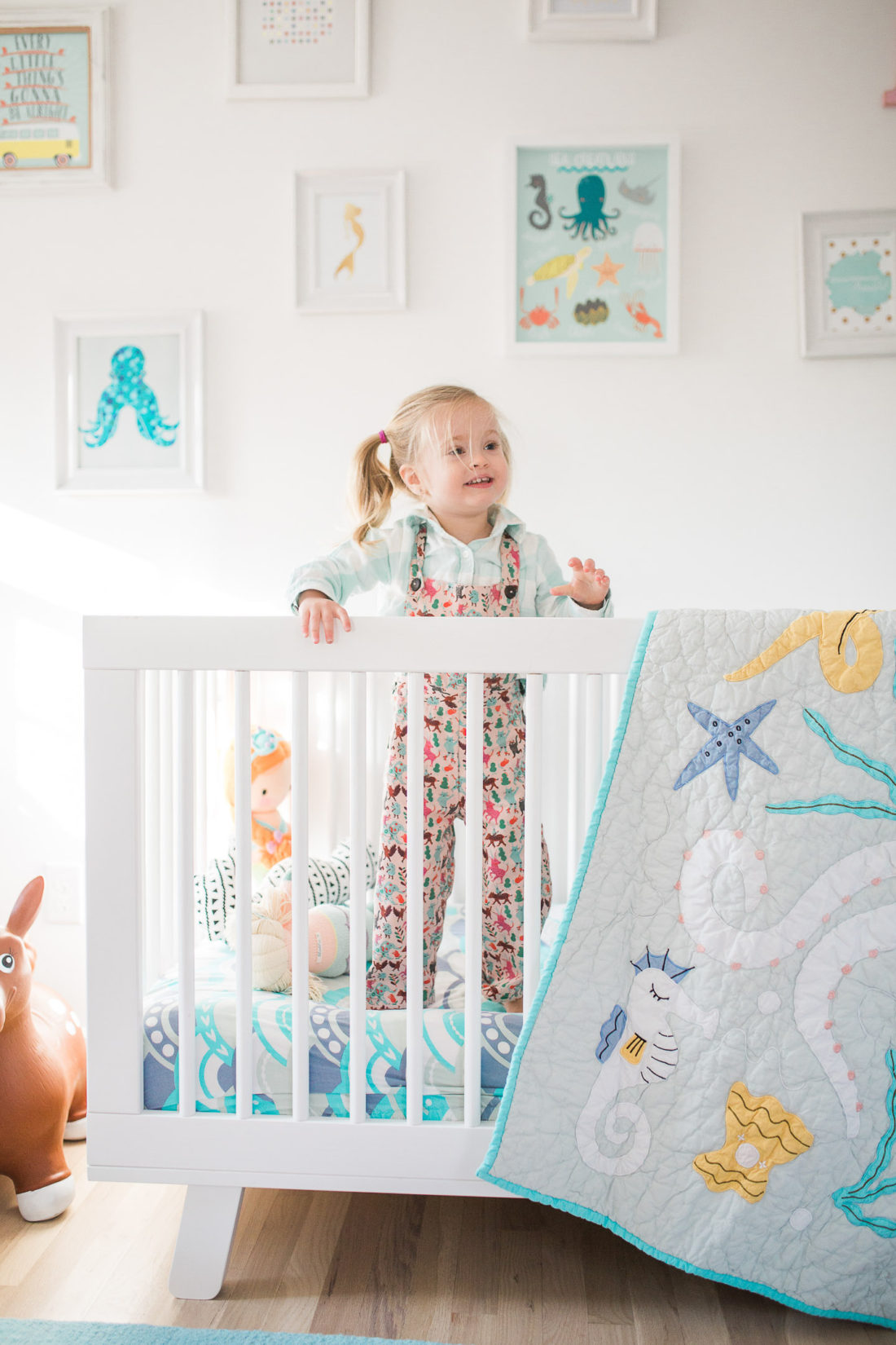 Marlowe Martino pictured in her mermaid inspired bedroom in her home in Connecticut designed by mother Eva Amurri Martino of lifestyle and motherhood blog REZTT