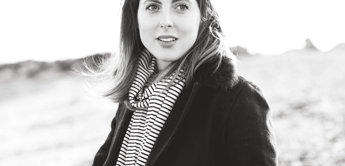 Eva Amurri Martino is bundled up on the sand on the beach in Westport CT in December