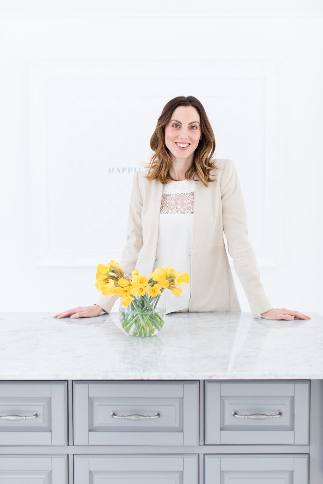 Eva Amurri Martino stands at the marble island in the center of the REZTT studio space