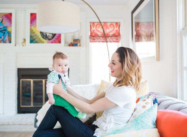 Eva Amurri Martino holds her infant son, Major, on her knee in the colorful family room of her Connecticut home