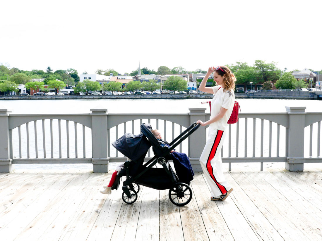 Eva Amurri Martino walks with her two children in a Baby Jogger Stroller down the street in downtown Westport