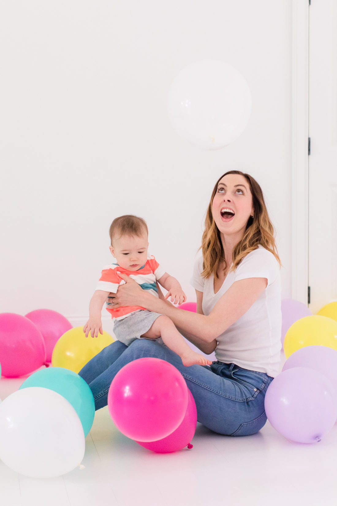 Eva Amurri Martino stands in the REZTT studio filled with balloons to celebrate the second anniversary of the blog