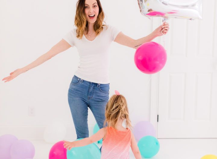 Eva Amurri Martino stands in the REZTT studio filled with balloons to celebrate the second anniversary of the blog