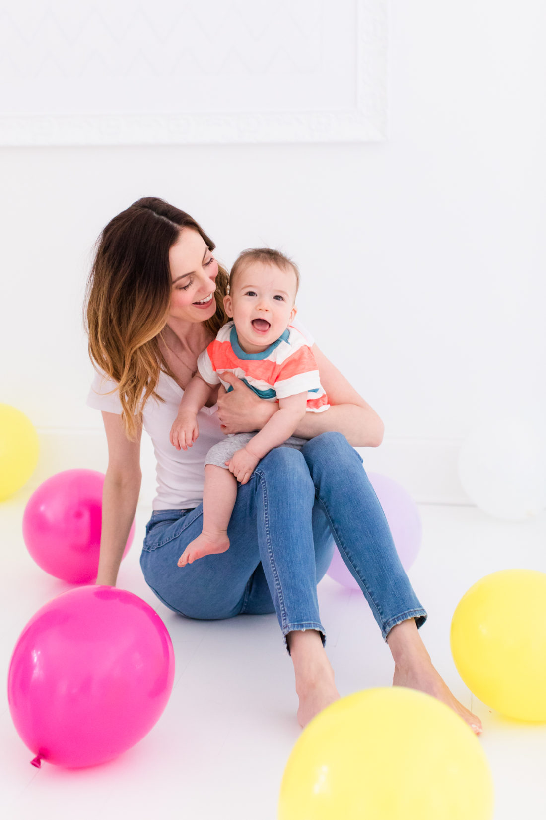 Eva Amurri Martino stands in the REZTT studio filled with balloons to celebrate the second anniversary of the blog