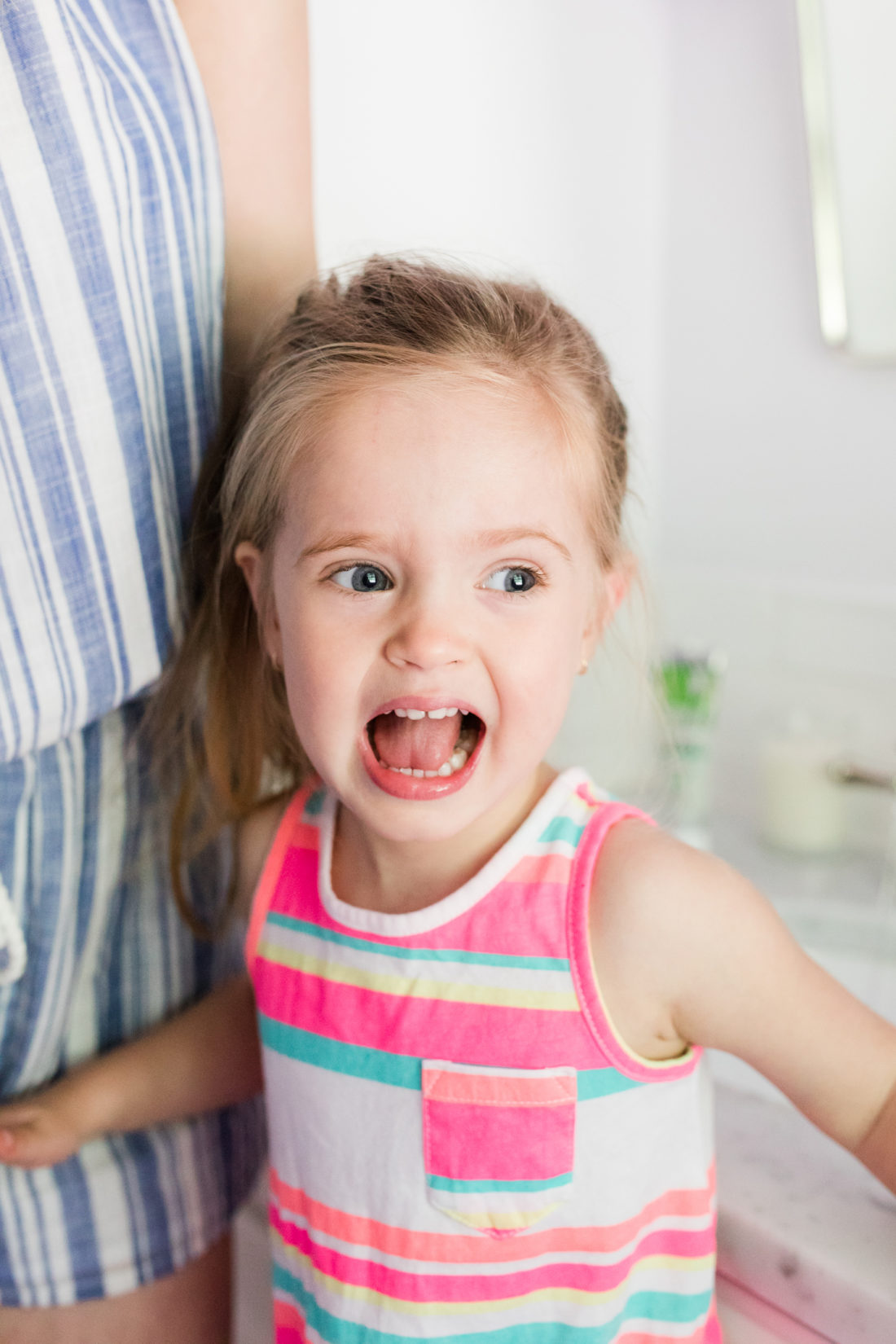 Marlowe Martino shows off her bright clean teeth after using all natural toothpaste