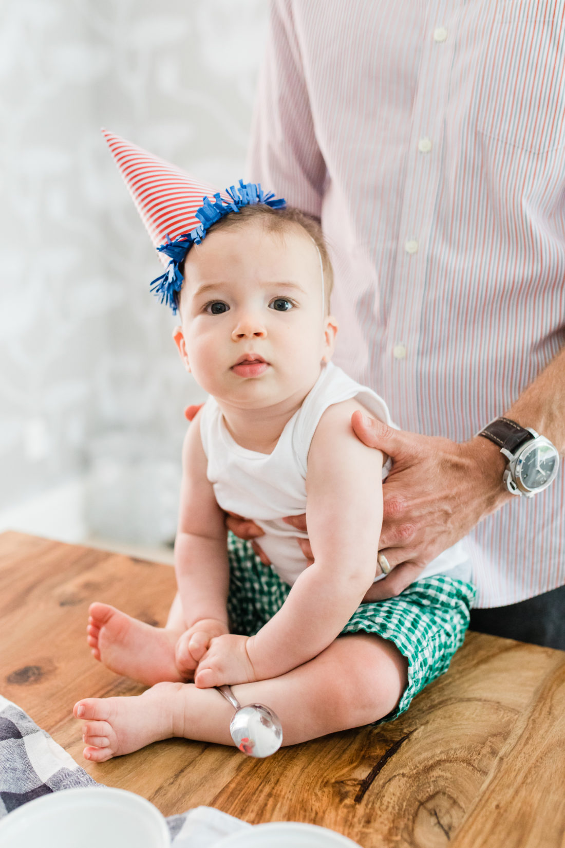 Major Martino wears a striped party hat to hang out at the REZTT ice cream social with Blue Bunny