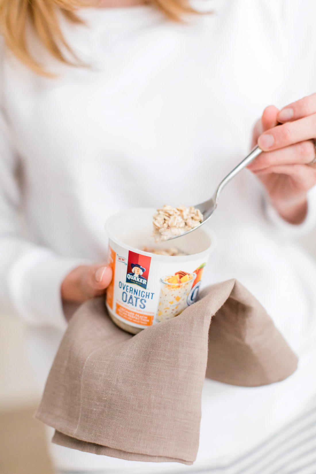 After steeping overnight, Eva Amurri Martino wears pajamas and prepares to eat her Quaker Overnight Oats for breakfast