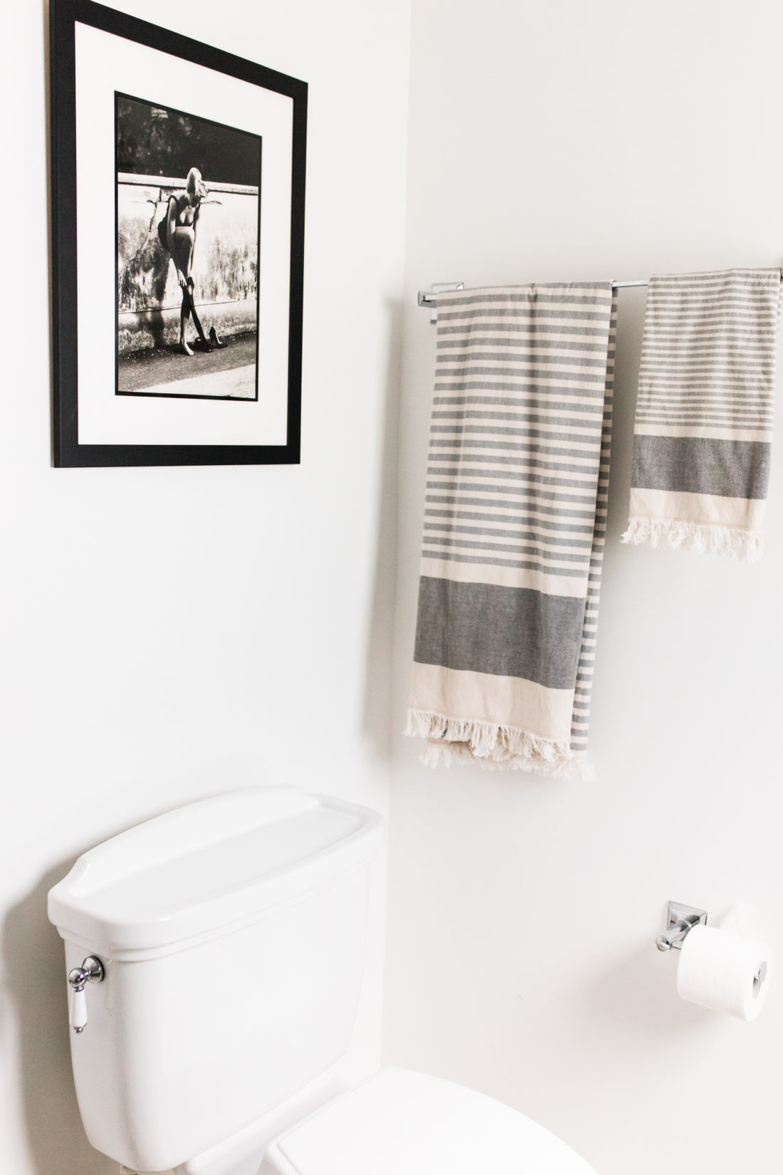 Eva Amurri Martino shares the full redesign of her black, white, and grey concept powder room in her Connecticut home