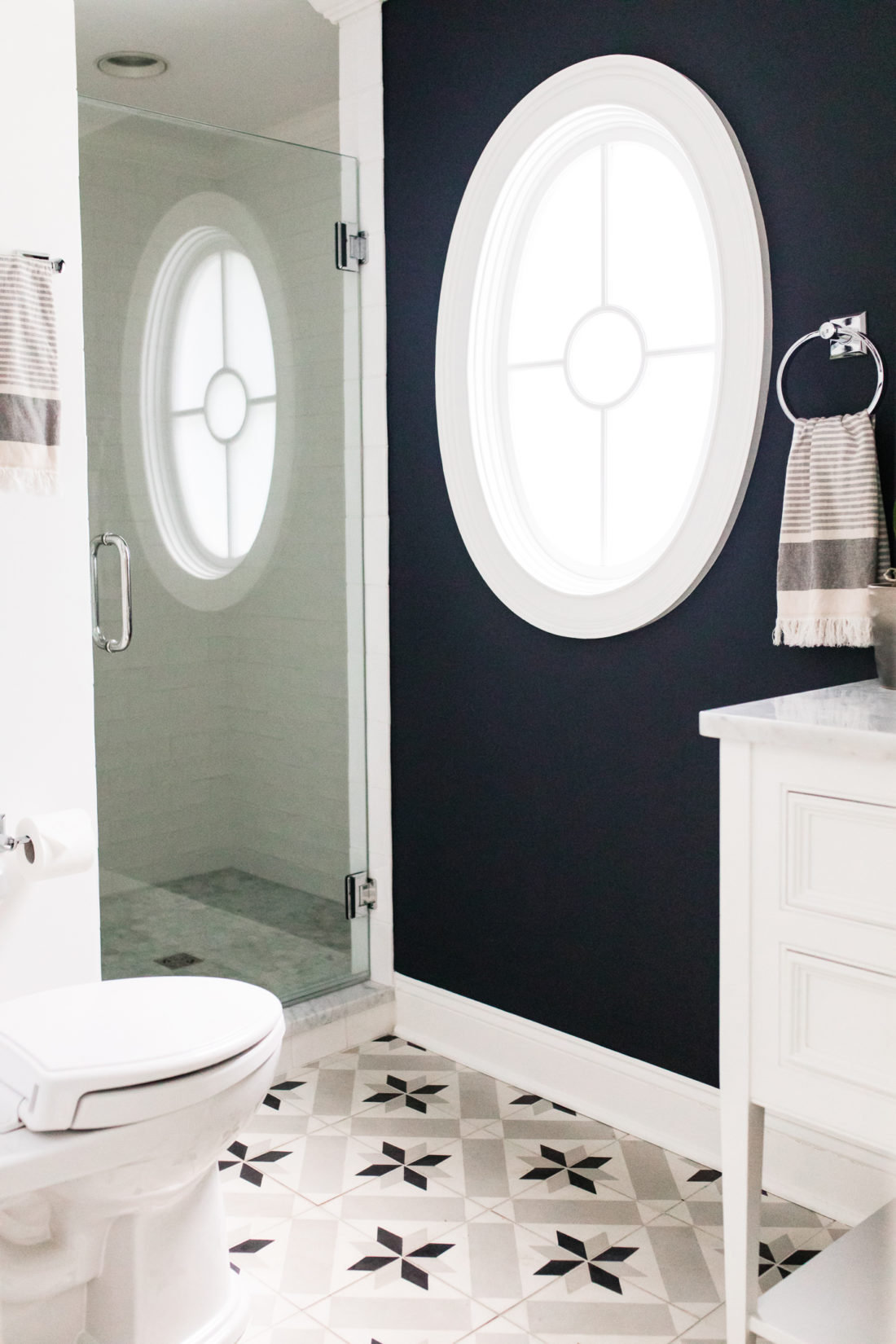 Eva Amurri Martino shares the full redesign of her black, white, and grey concept powder room in her Connecticut home