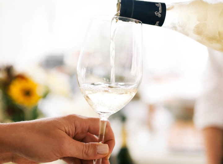 A glass of white wine is poured at Eva Amurri Martino's Connecticut home