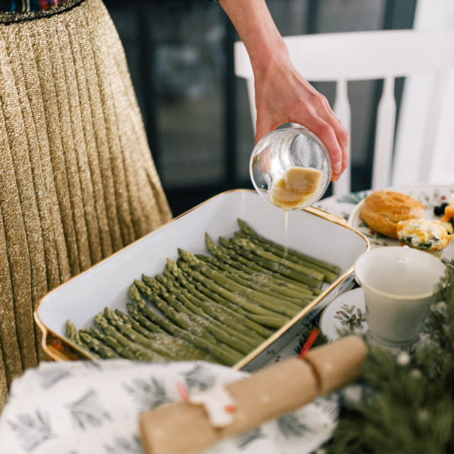 Eva Amurri Martino pours a lemony mustard vinaigrette over poached asparagus spears