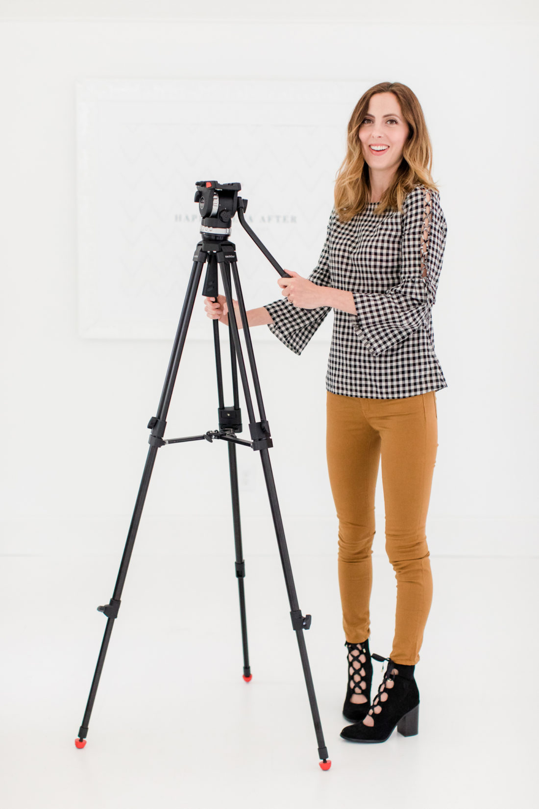 Eva Amurri Martino stands with her camera tripod in the REZTT studio in Connecticut