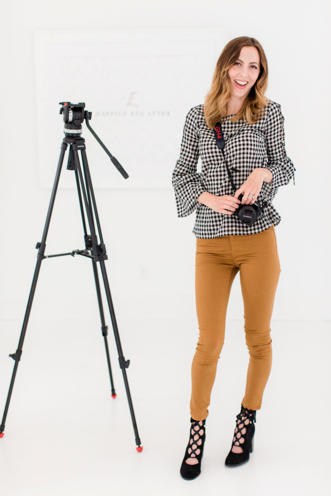 Eva Amurri Martino stands with her camera tripod in the REZTT studio in Connecticut