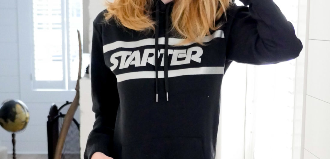 Eva Amurri Martino wears a hoodie athliesure dress with over the knee boots