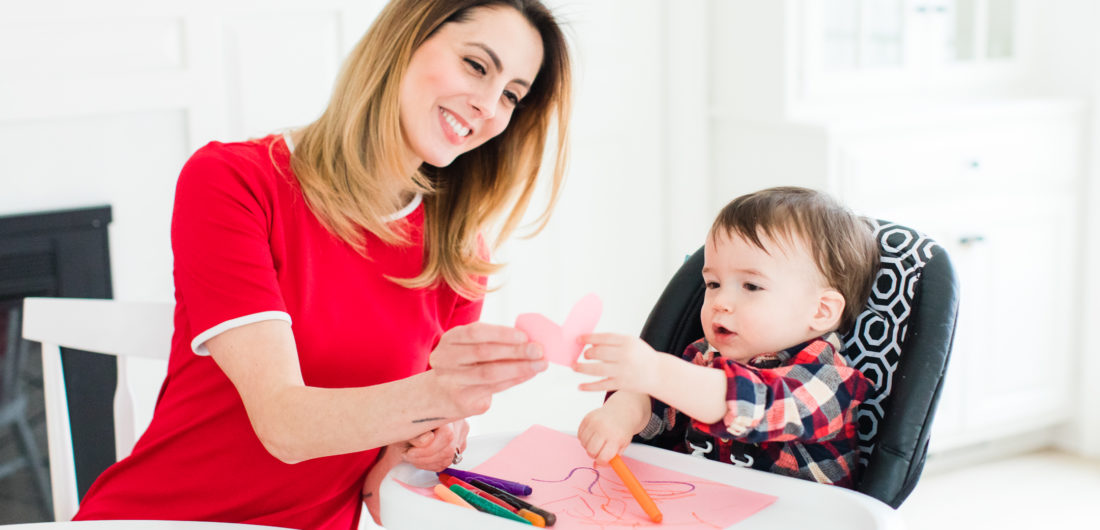 Eva Amurri Martino hands Major Martino a cutout paper heart