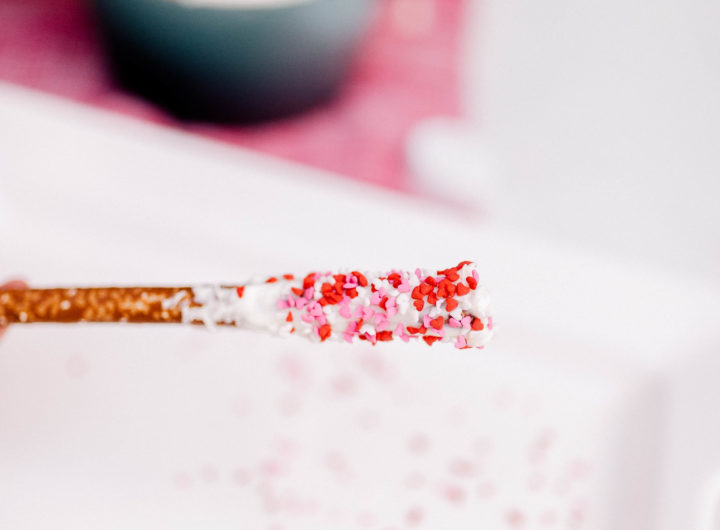 Valentine's Day sprinkles on a chocolate covered pretzels