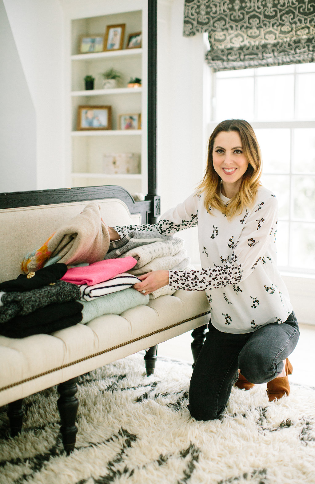 Eva Amurri Martino organizes her sweaters as part of her closet cleanout