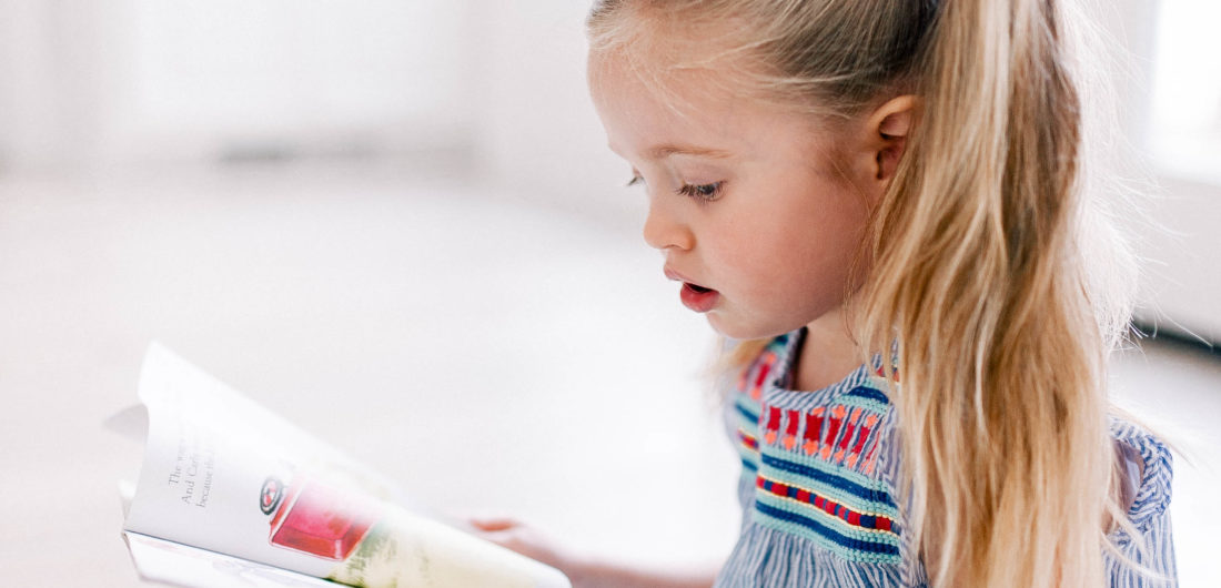 Eva Amurri's daughter Marlowe reads one of her favorite kids' book on the kitchen floor of her Connecticut home.