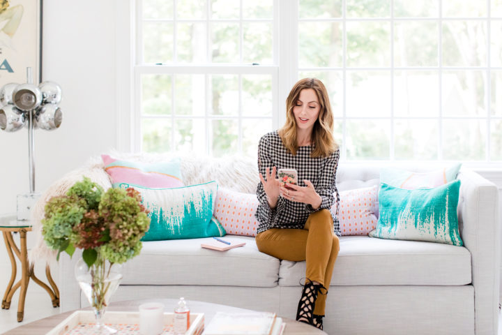 Eva Amurri Martino scrolls through her cell phone while she sits in the REZTT studio in Connecticut
