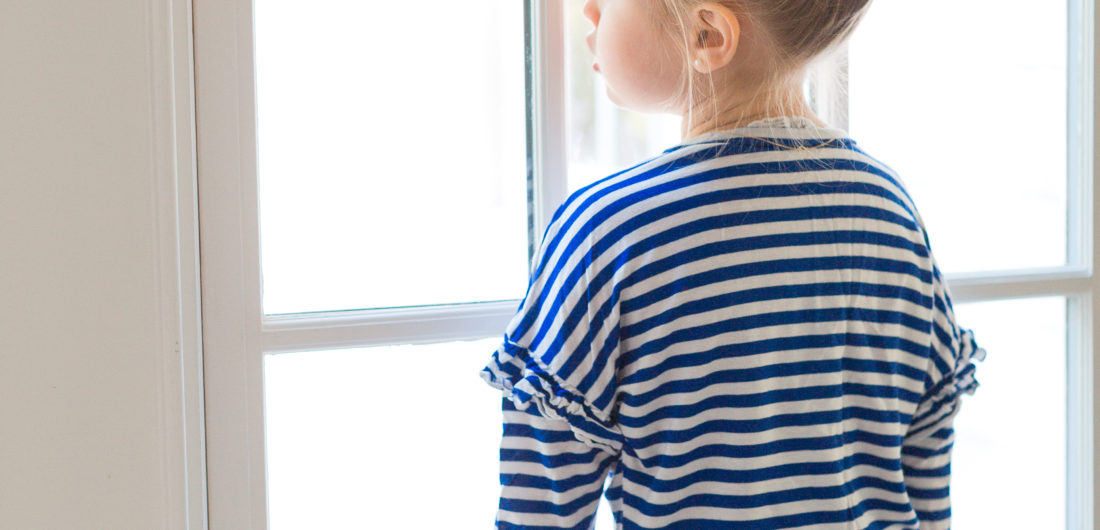 Eva Amurri Martino's daughter Marlowe looks longingly out the window of their Connecticut home
