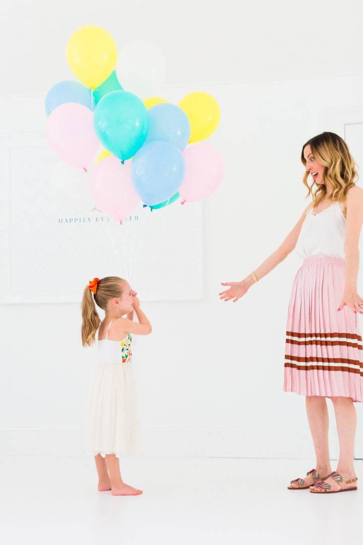 Eva Amurri Martino throws her hands in the air to celebrate the 3rd birthday of her blog REZTT
