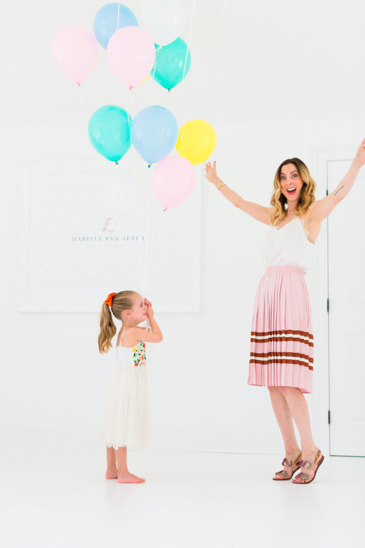 Eva Amurri Martino throws her hands in the air to celebrate the 3rd birthday of her blog REZTT