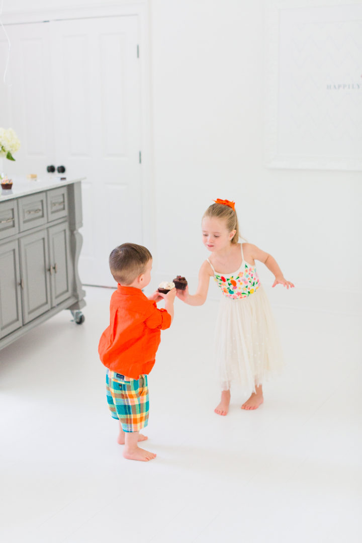 Eva Amurri Martino's kids Marlow and Major cheers with cupcakes to celebrate the 3rd birthday of her blog REZTT