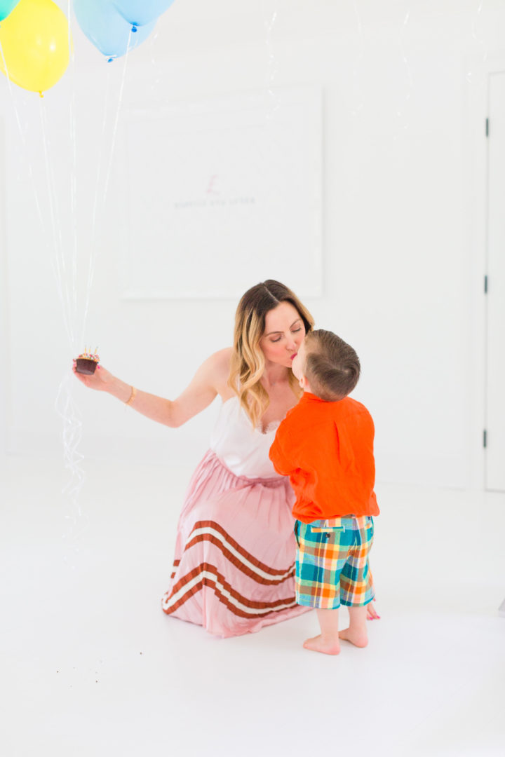 Eva Amurri Martino sweetly kisses her son Major while they both enjoy cupcakes to celebrate the 3rd birthday of her blog REZTT