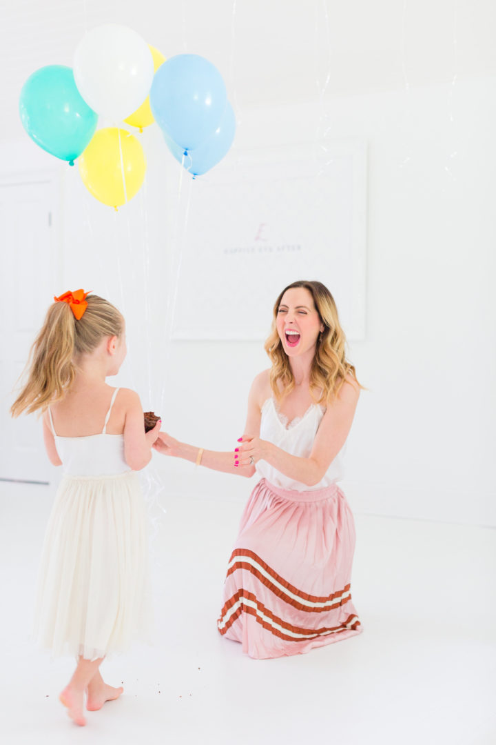 Eva Amurri Martino throws her hands in the air to celebrate the 3rd birthday of her blog REZTT