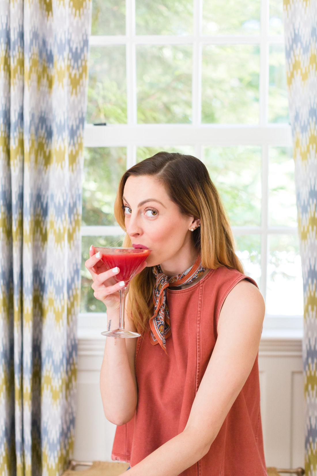 Eva Amurri Martino sips from a blood orange and ginger martini
