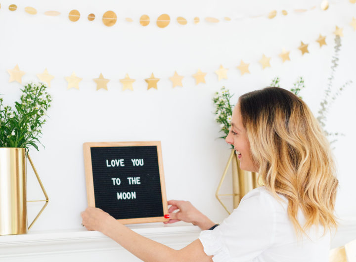 Eva Amurri Martino displays a 'Love You To The Moon' sign at her Celestial Baby Sprinkling Party
