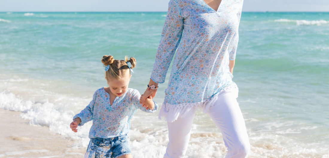Eva Amurri Martino and Marlowe Martino wear matching REZTT x Masala Baby tunics and run along the water's edge in Miami FL