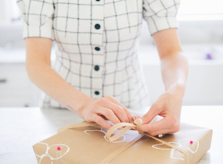 Eva Amurri Martino wraps a gift in stamped Easter wrapping paper