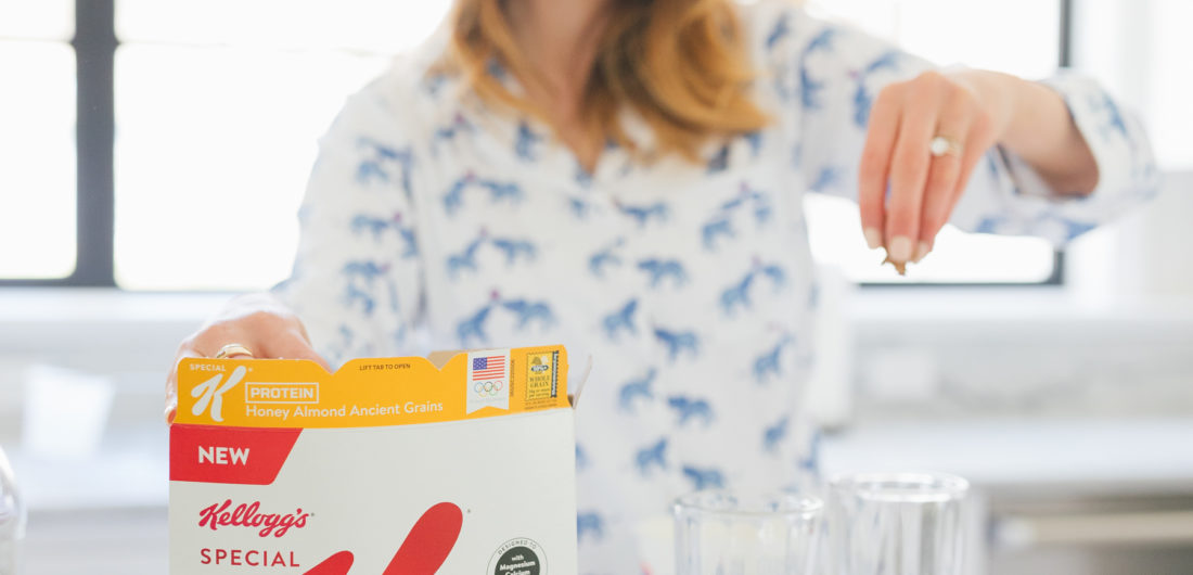 Eva Amurri Martino of REZTT sprinkles Special K Ancient Grains in a parfait