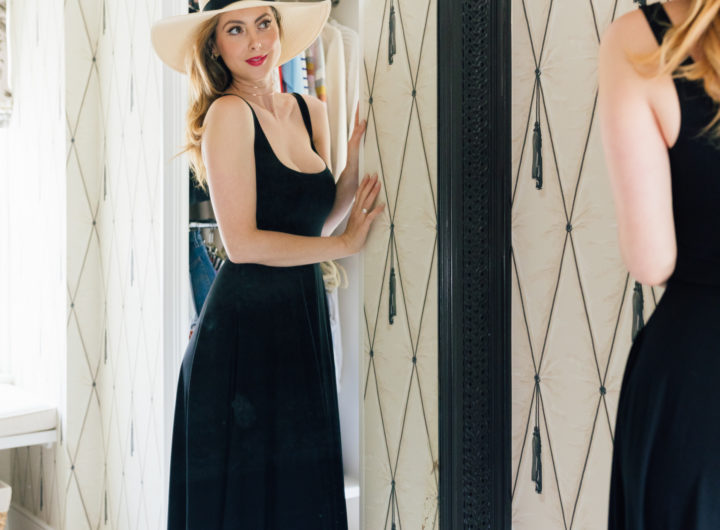 Eva Amurri Martino wears a hat while looking in the mirror