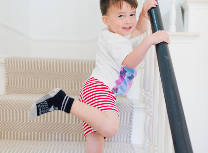 Major Martino stands on the stairs wearing his new big boy underwear as he starts the potty training process