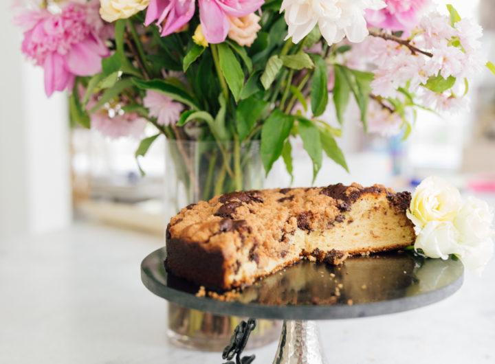 Eva Amurri Martino's coffee cake next to a vase of gorgeous flowers
