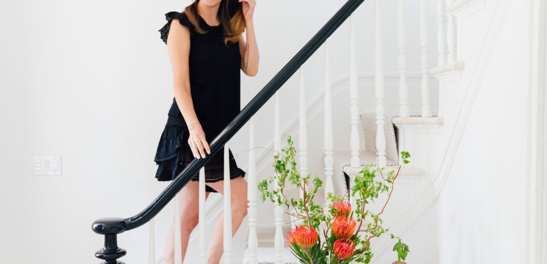 Eva Amurri Martino walks up the staircase of the entry way of her Connecticut home